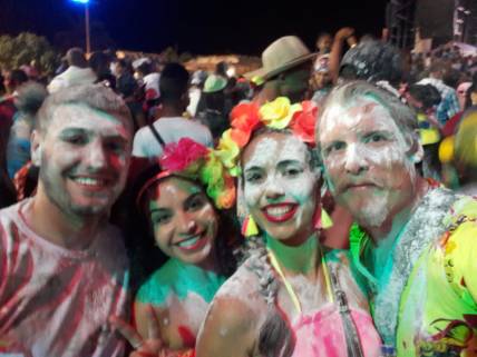 With fellow Peace Corps Volunteers covered in flour and foam, from left to right: Matt Plaus, Monica Malcomson, Alexandra Tracy (me), and Kyle King